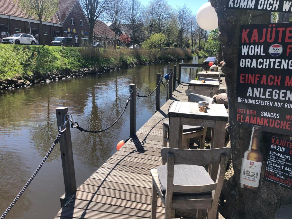 Gaestehaus Kajuete Direkt Am Wasser Friedrichstadt Exterior foto