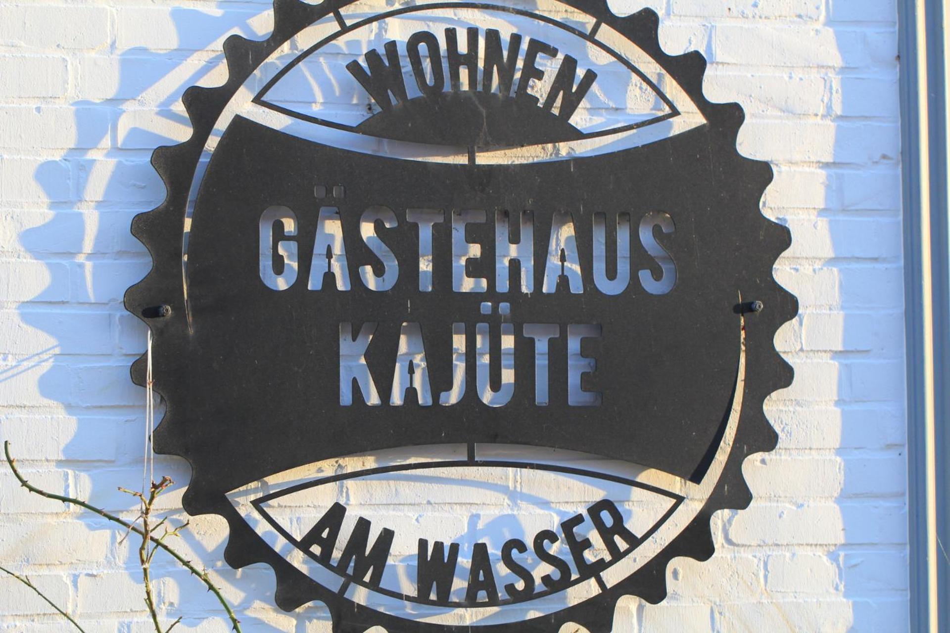 Gaestehaus Kajuete Direkt Am Wasser Friedrichstadt Exterior foto